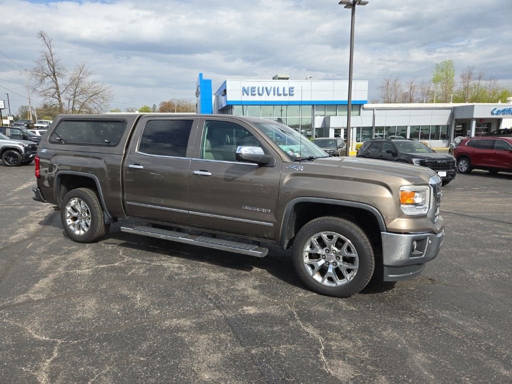 2015 GMC Sierra 1500 SLT in Bronze Alloy Metallic — front three-quarter view