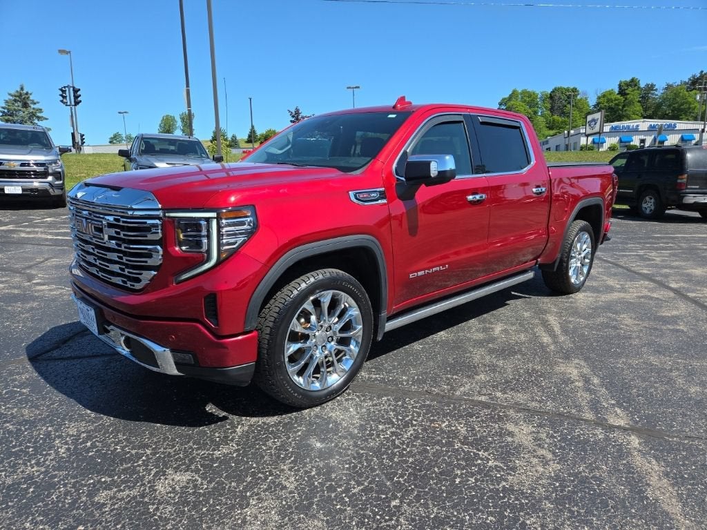 2023 GMC Sierra 1500 Denali in Volcanic Red Tintcoat — front three-quarter view